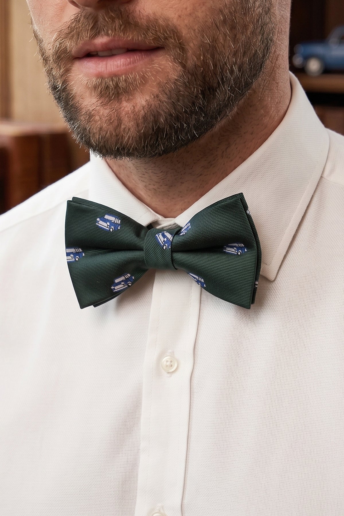 Man wearing Green Mini Bow Tie for men featuring a deep green shade with subtle detailing, crafted for those who appreciate classic elegance and a refined, timeless formal style.
