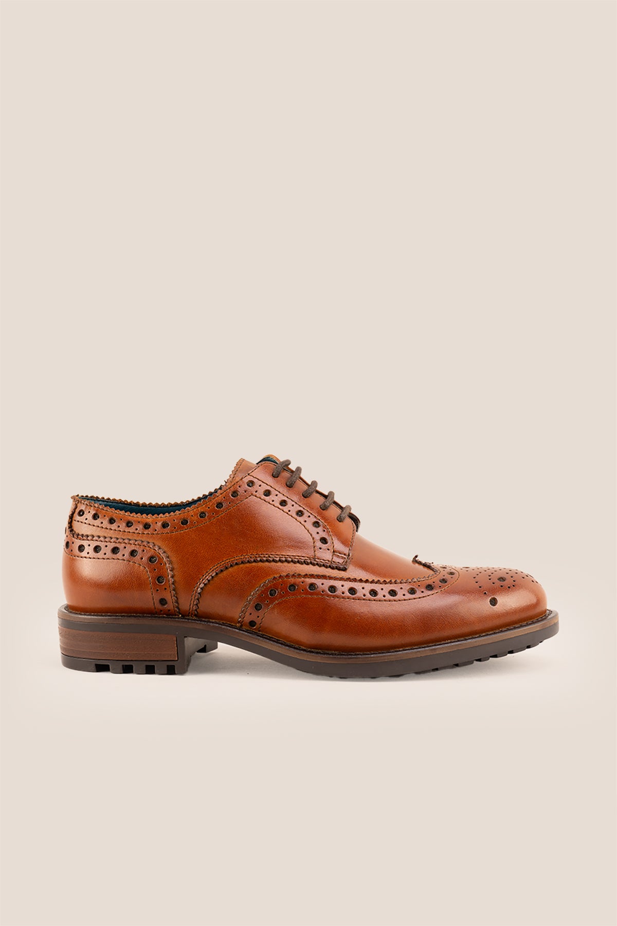 George Tan leather shoes for men. Featuring a five-eyelet wing cap brogue design, these shoes offer timeless style and comfort
