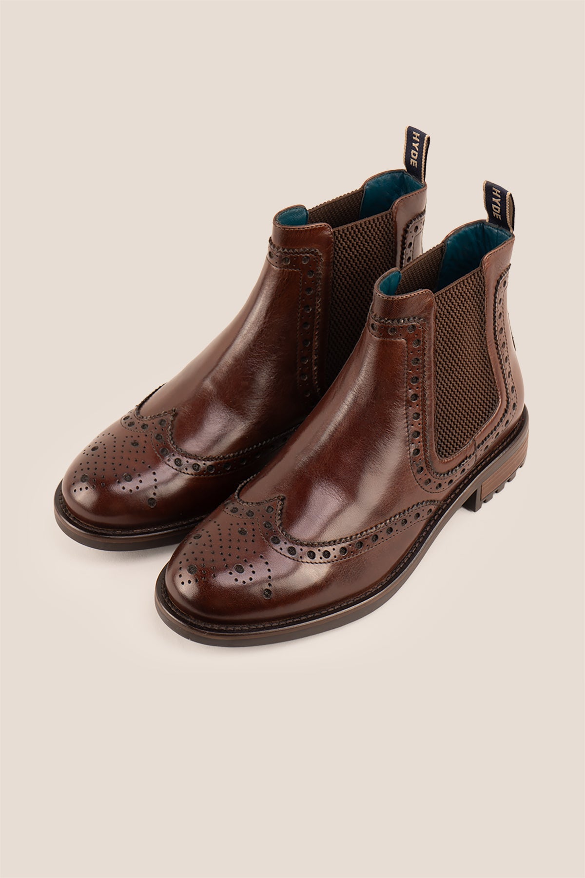 Gavin Brown leather Chelsea boots for men featuring a classic wing cap brogue design with refined stitching and polished finish