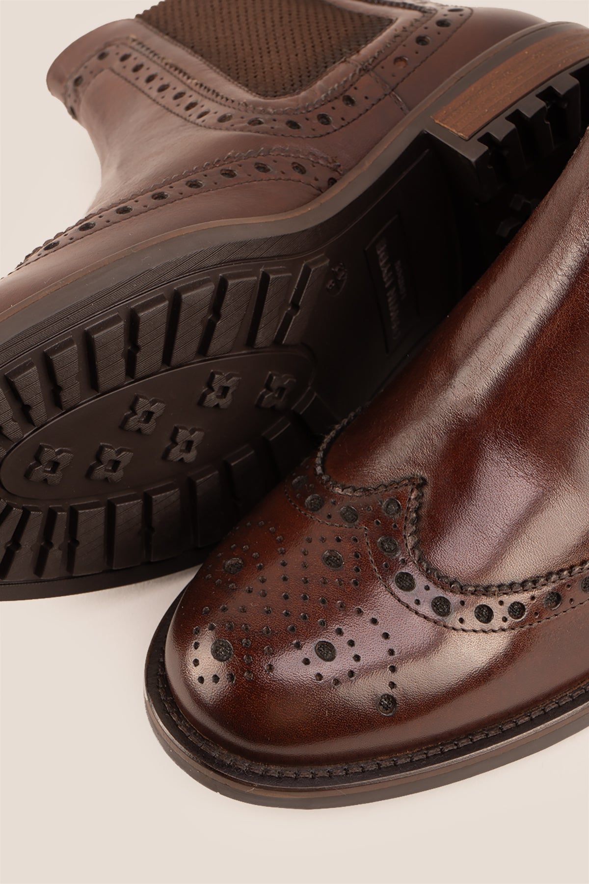 Gavin Brown leather Chelsea boots for men featuring a classic wing cap brogue design with refined stitching and polished finish