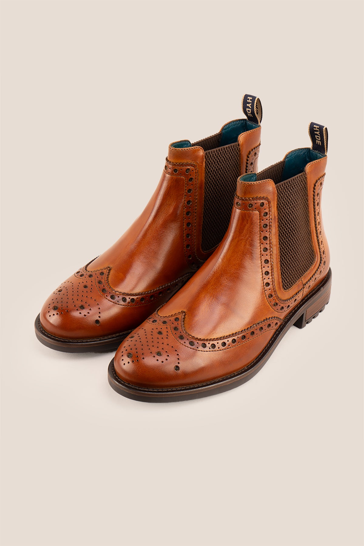 Gavin Tan leather Chelsea boots for men featuring a classic wing cap brogue design with refined stitching and polished finish