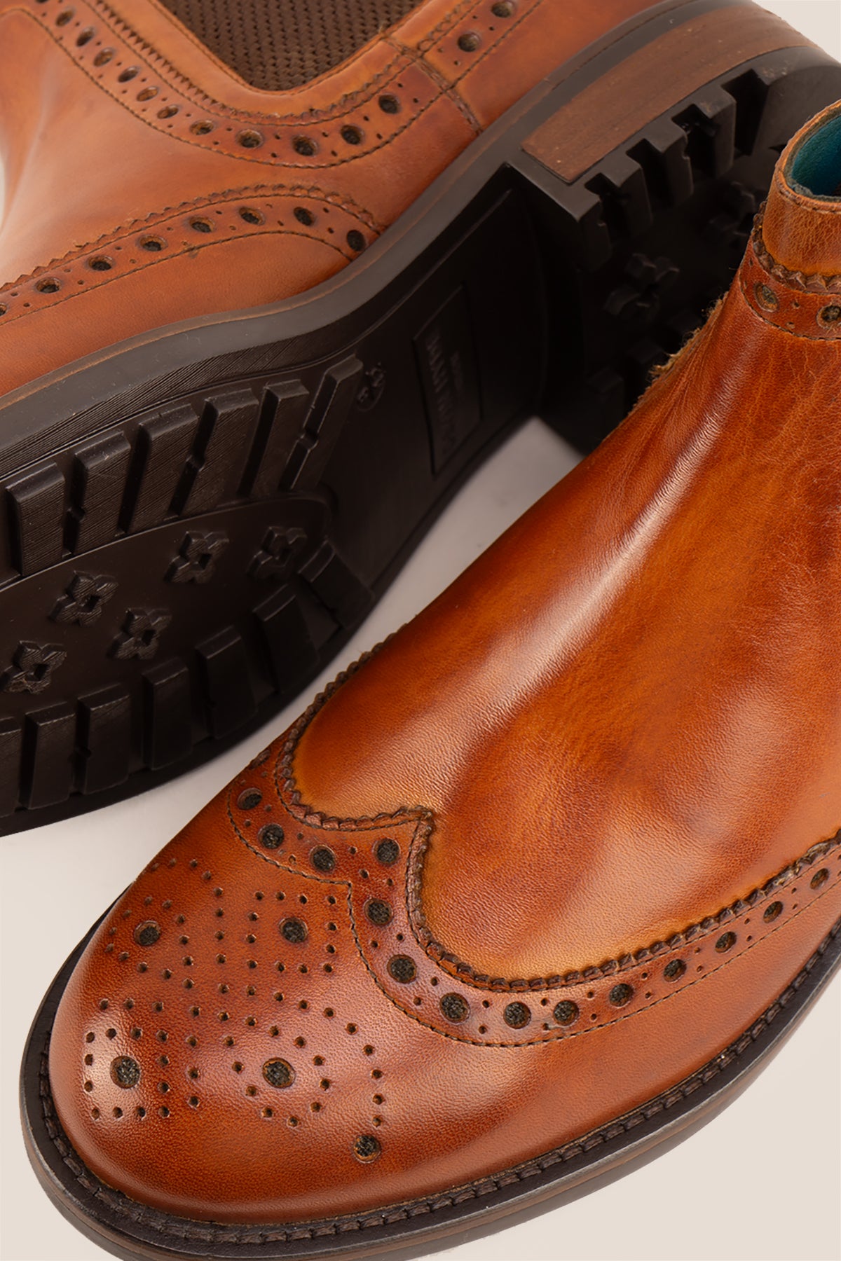 Gavin Tan leather Chelsea boots for men featuring a classic wing cap brogue design with refined stitching and polished finish