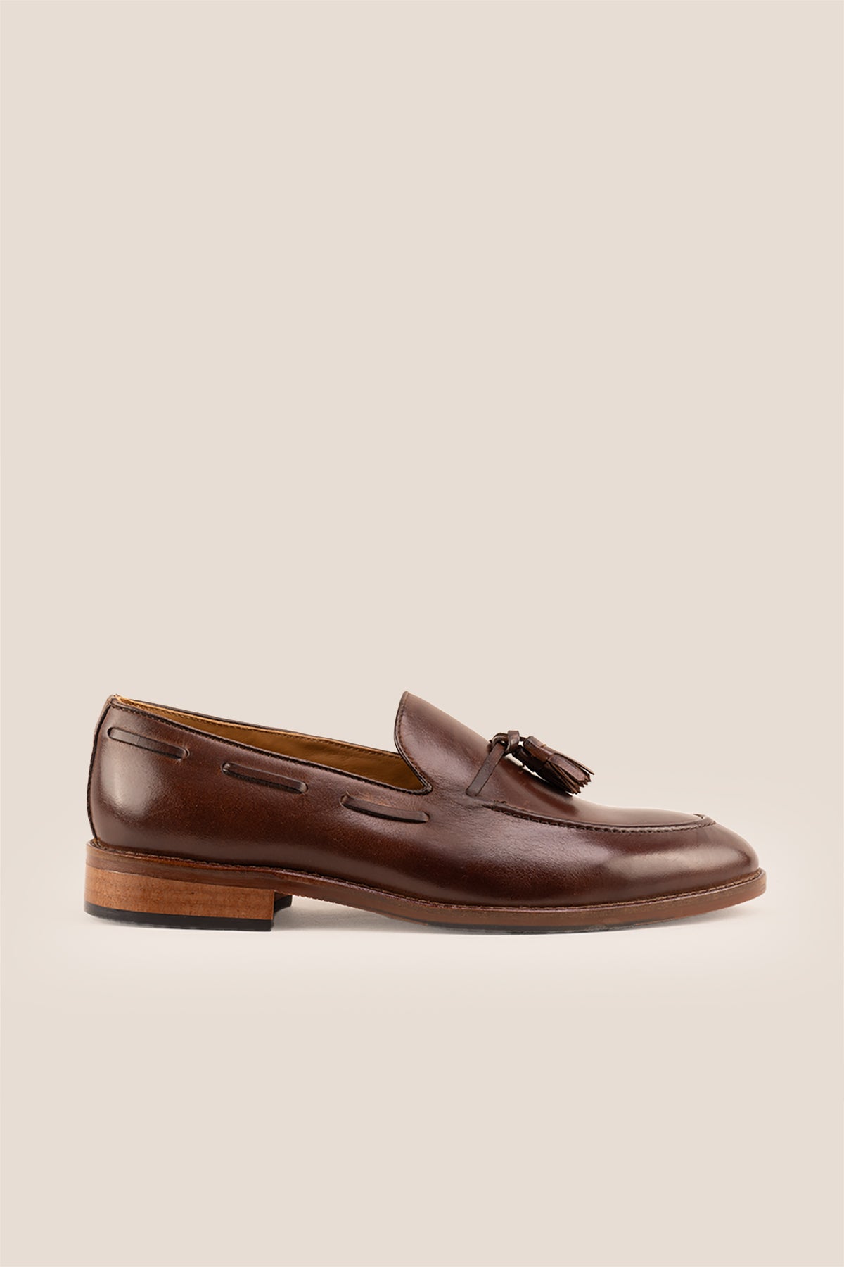 Issac Brown leather tassel loafers for men with comfort sole, stylish and supportive, perfect for modern smart-casual looks.