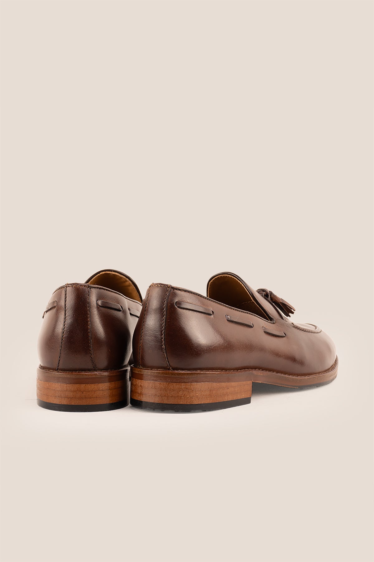 Issac Brown leather tassel loafers for men with comfort sole, stylish and supportive, perfect for modern smart-casual looks.