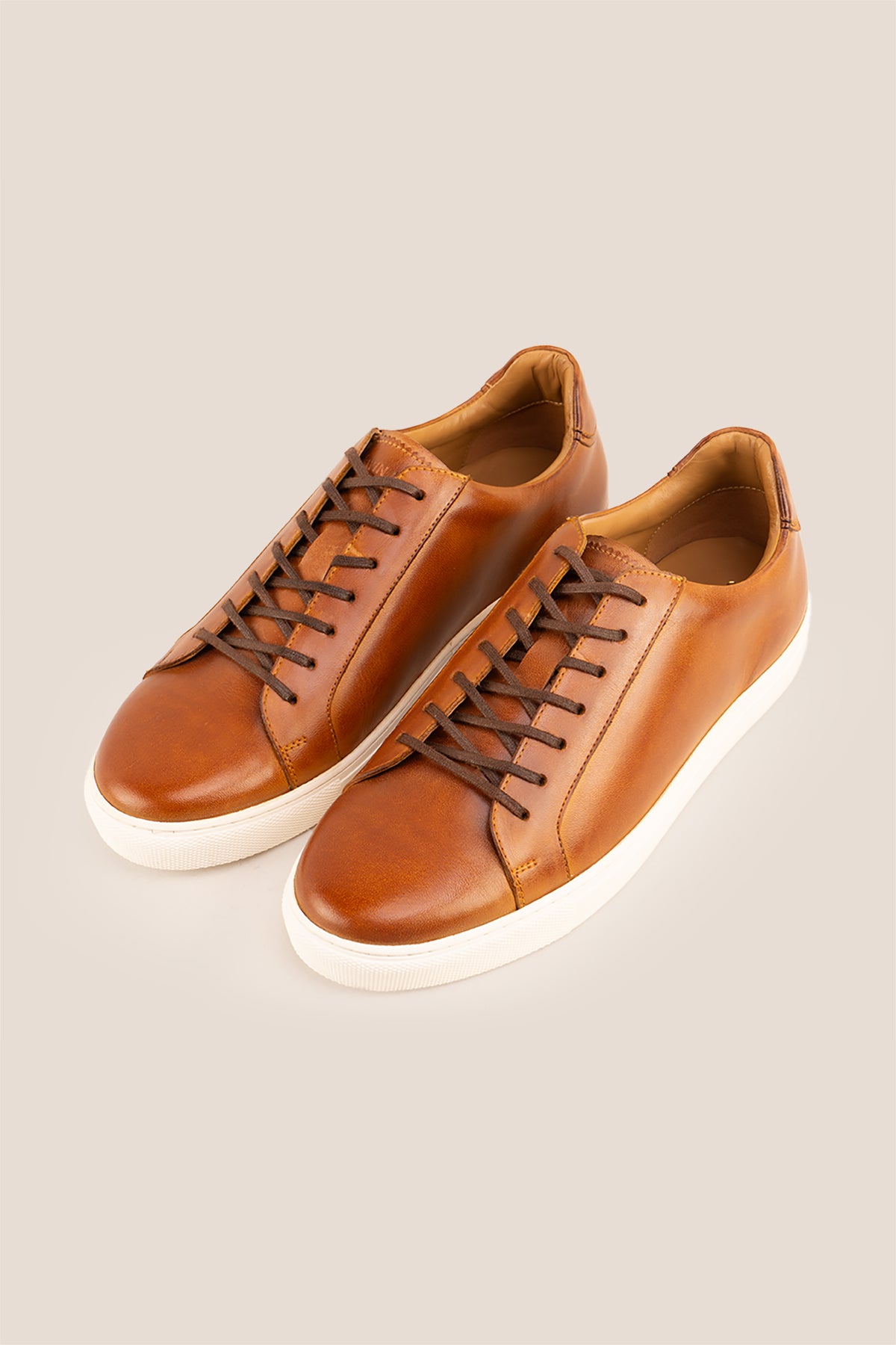 Harper tan leather men’s classic trainers featuring premium leather and sleek design, ideal for smart casual and everyday wear.