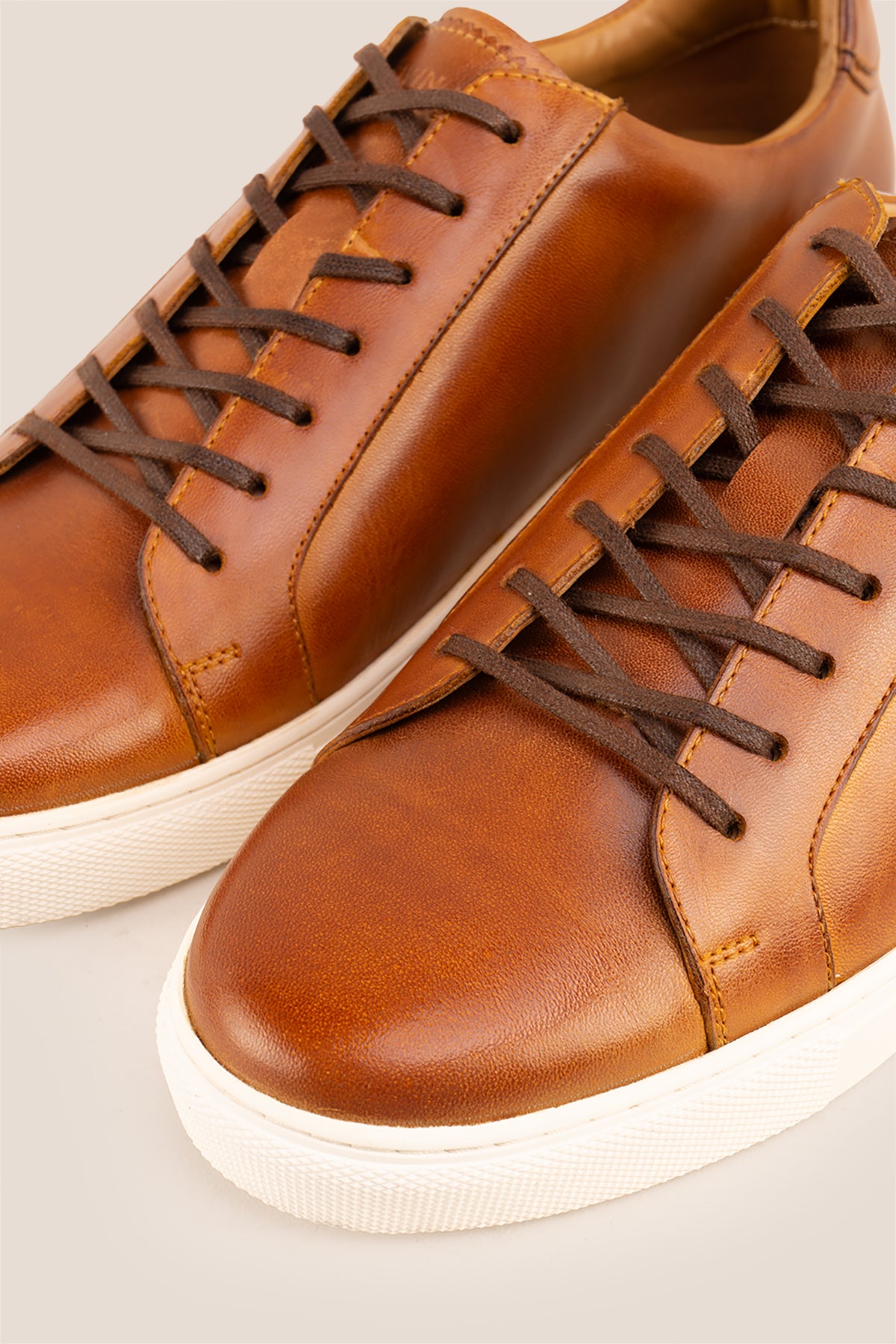 Harper tan leather men’s classic trainers featuring premium leather and sleek design, ideal for smart casual and everyday wear.