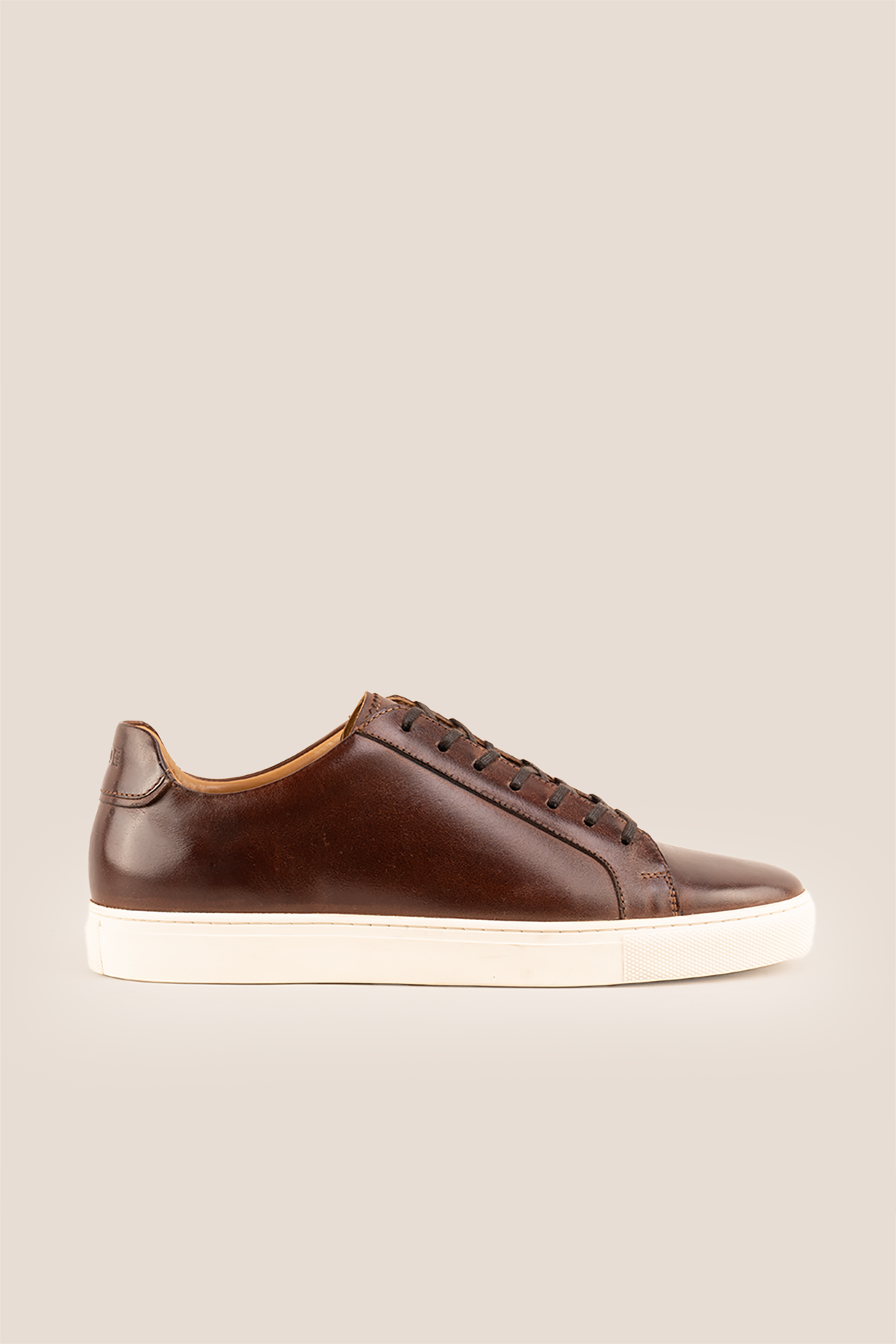Harper brown leather classic trainers for men featuring durable leather upper and comfortable sole, ideal for casual and smart-casual wear.
