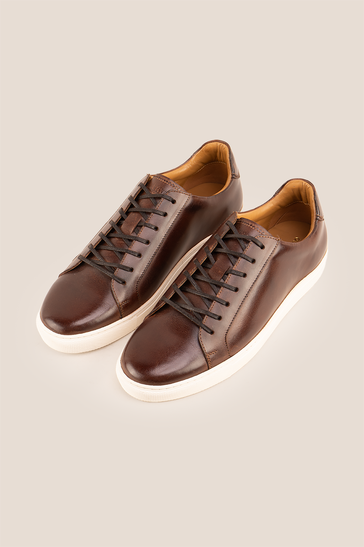 Harper brown leather classic trainers for men featuring durable leather upper and comfortable sole, ideal for casual and smart-casual wear.