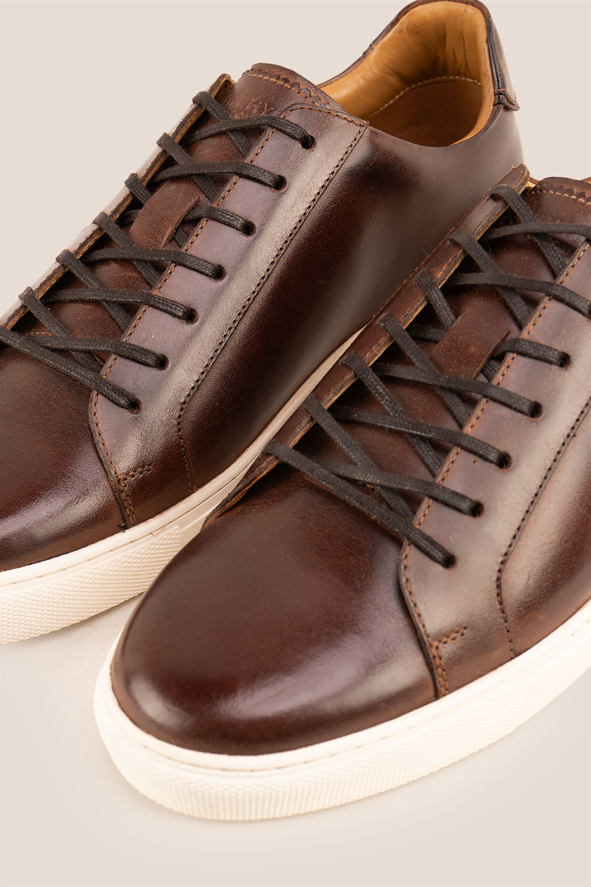 Harper brown leather classic trainers for men featuring durable leather upper and comfortable sole, ideal for casual and smart-casual wear.