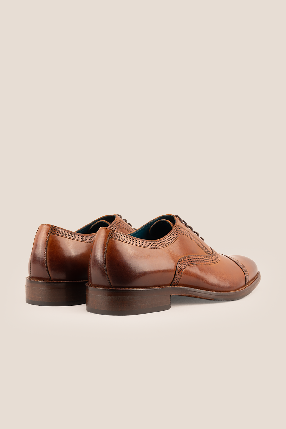 Creed tan men's leather shoes with timeless five-eyelet toecap brogue design, crafted in premium leather for a refined, sophisticated look