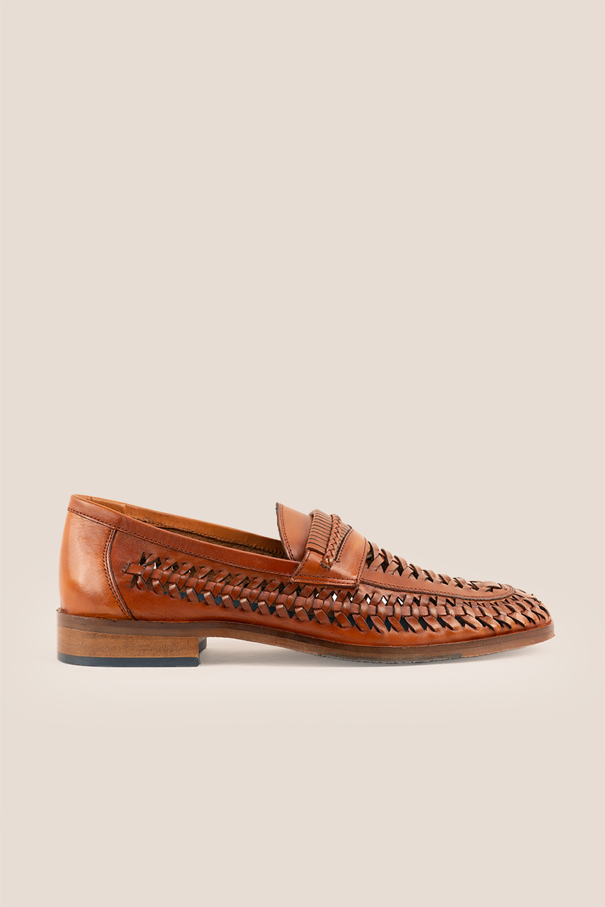 Finley tan woven leather loafer for men, showcasing premium craftsmanship with a sophisticated and timeless design
