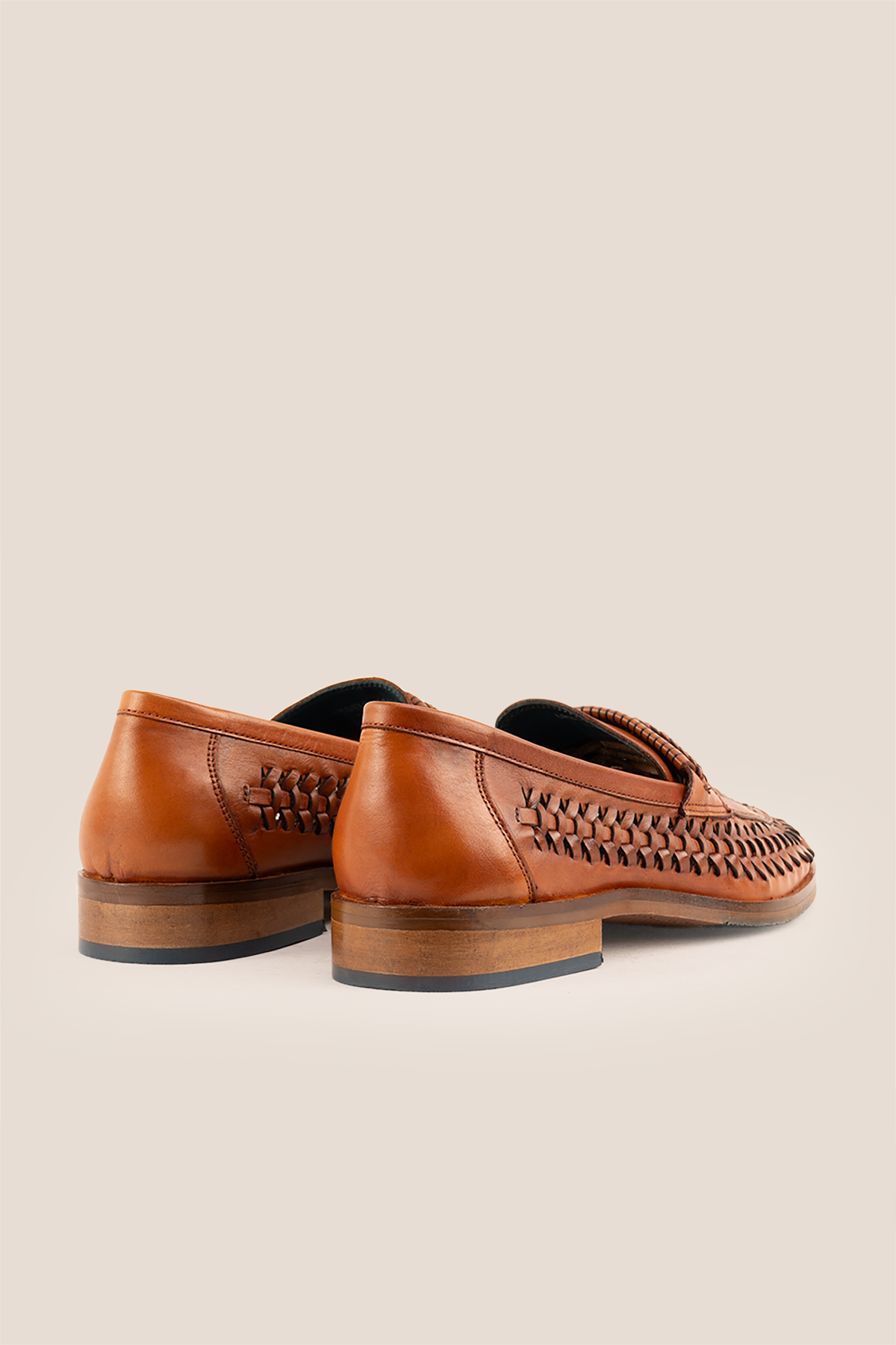Finley tan woven leather loafer for men, showcasing premium craftsmanship with a sophisticated and timeless design