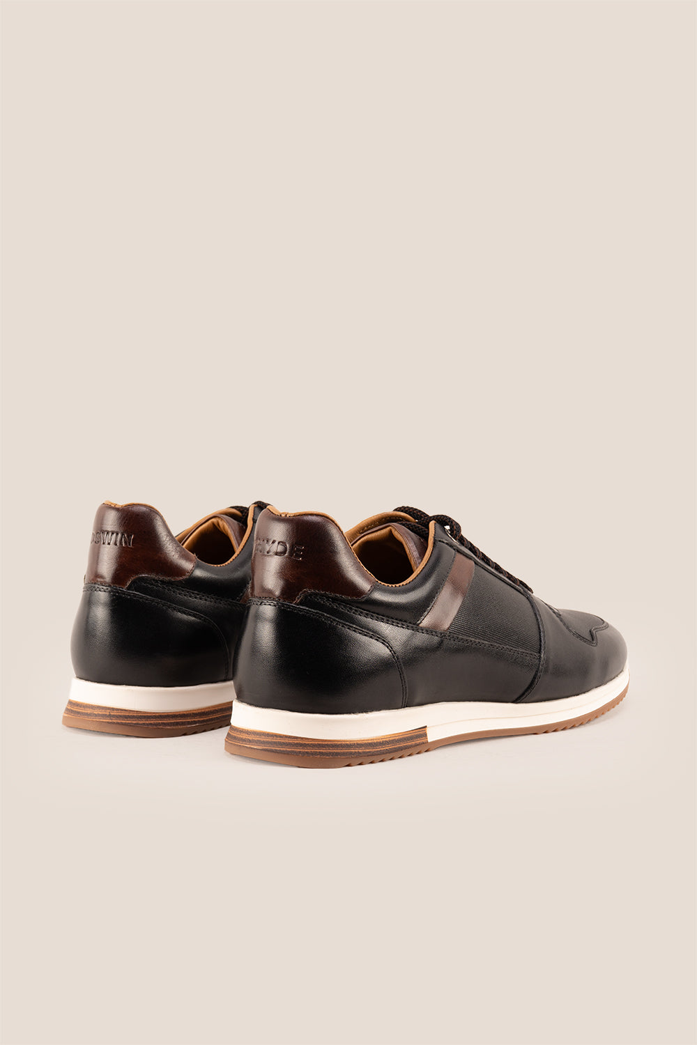Rory black leather sneakers for men with smooth finish and minimalist design, ideal for casual and smart-casual wear