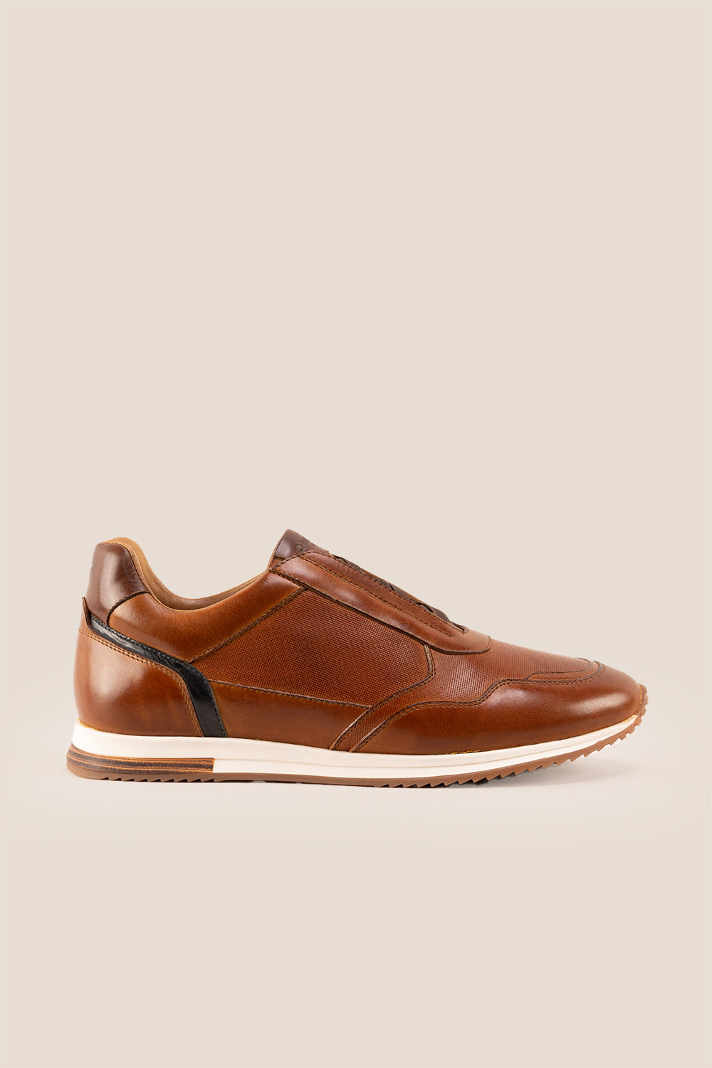 Colt tan men’s leather sneakers with elastic detailing for a secure, comfortable fit and modern casual style