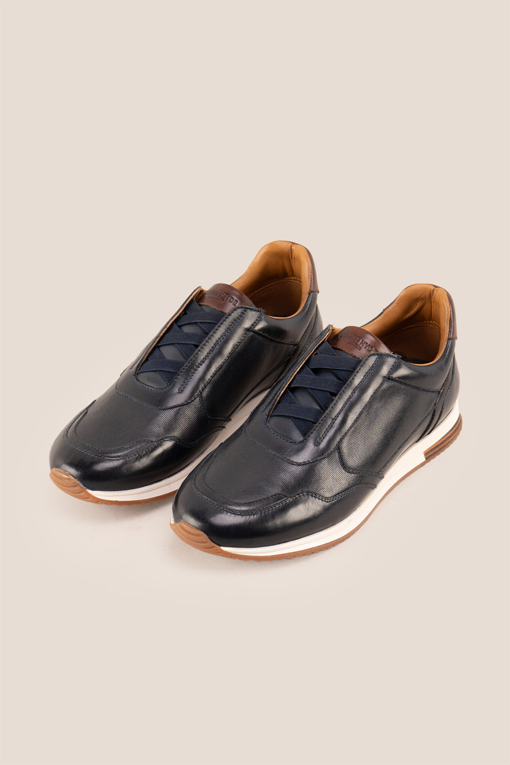 Colt Navy men's leather sneakers, featuring a clever elastic design that ensures a comfortable and secure fit. 
