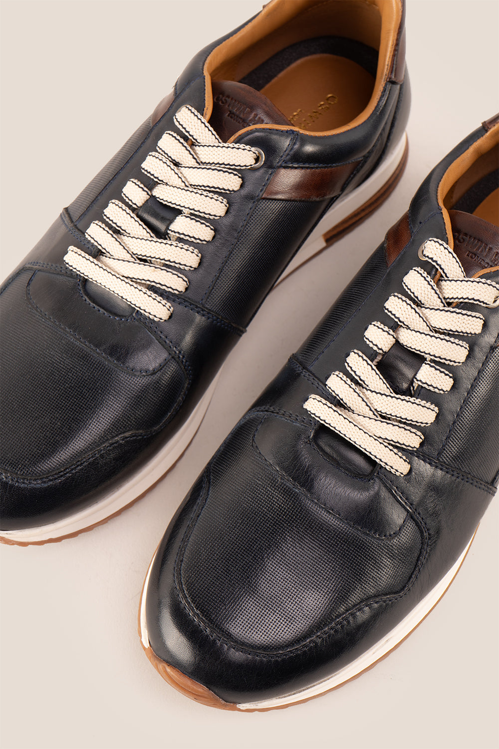 Rory navy leather sneakers for men with minimalist design and durable sole, perfect for casual and smart-casual outfits