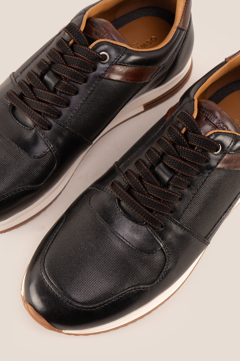 Rory black leather sneakers for men with smooth finish and minimalist design, ideal for casual and smart-casual wear