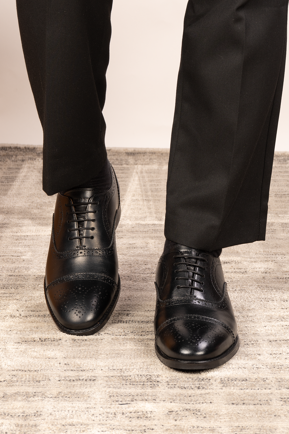 Westminster black leather Oxford shoes for men featuring classic five-eyelet brogue toecap design—perfect for formal events, office wear, and elegant styling.