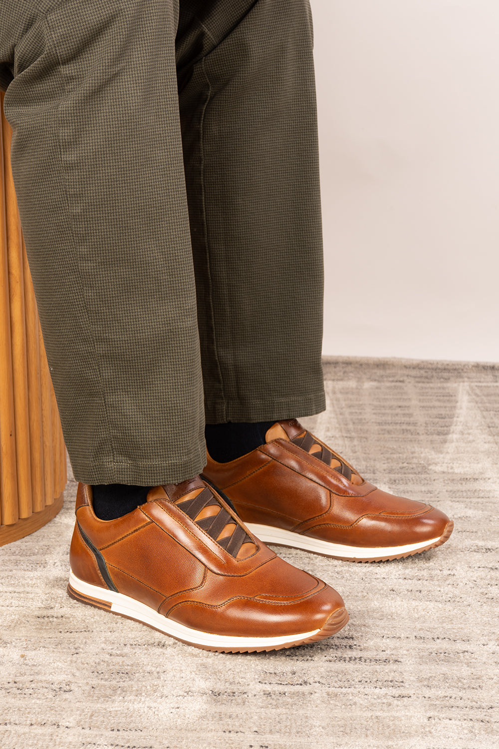 Colt tan men’s leather sneakers with elastic detailing for a secure, comfortable fit and modern casual style