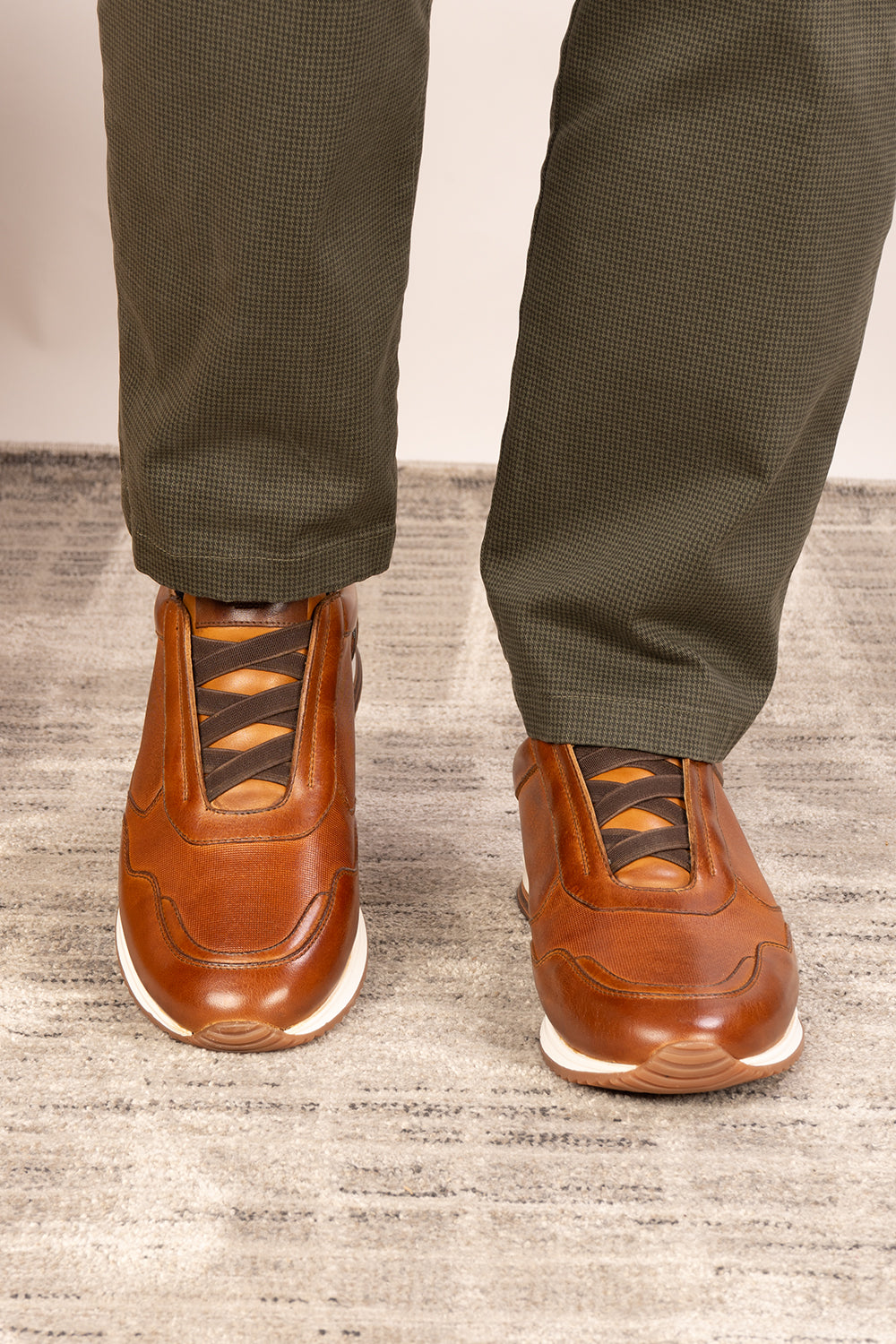 Colt tan men’s leather sneakers with elastic detailing for a secure, comfortable fit and modern casual style