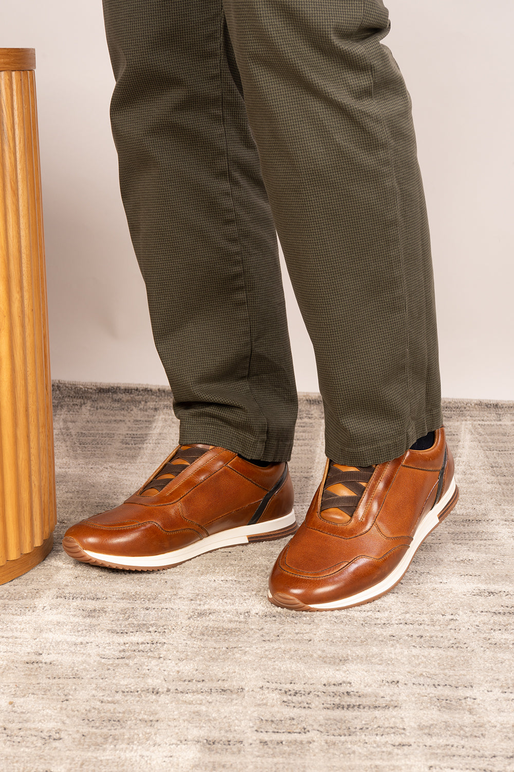 Colt tan men’s leather sneakers with elastic detailing for a secure, comfortable fit and modern casual style