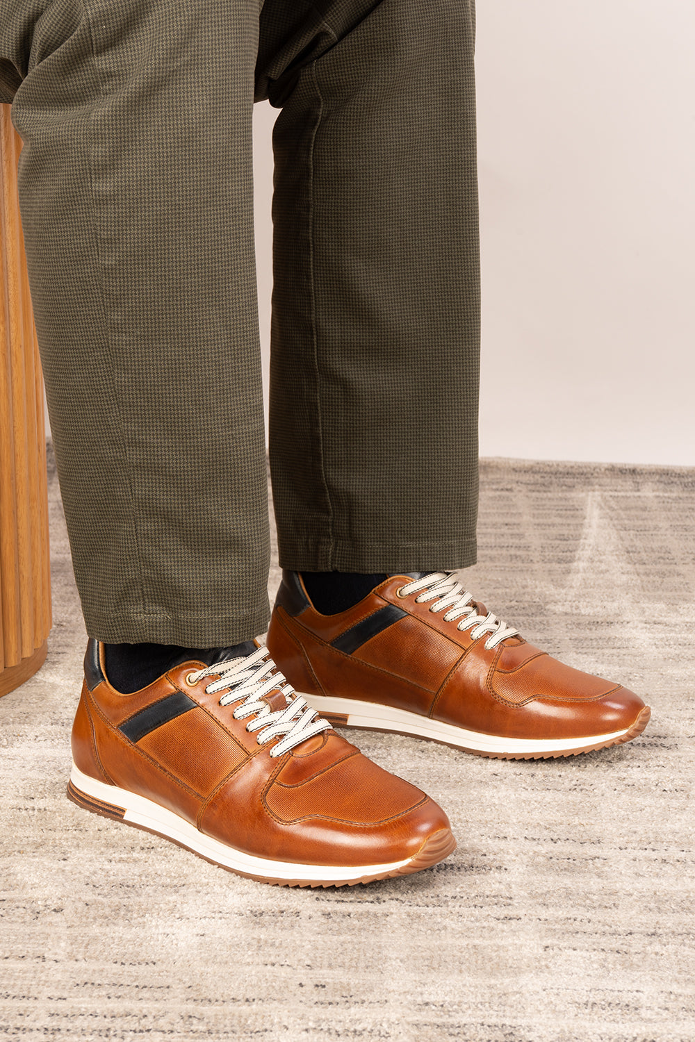 Rory Tan leather sneakers for men, featuring a classic design that exudes timeless elegance. 