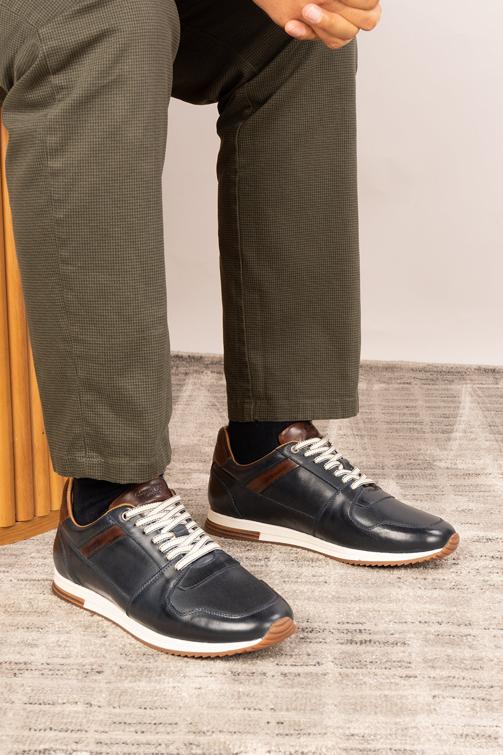 Rory navy leather sneakers for men with minimalist design and durable sole, perfect for casual and smart-casual outfits