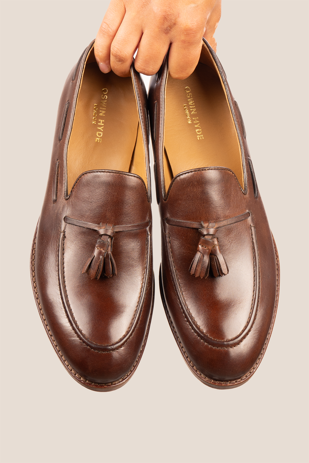 Issac brown leather tassel loafers for men with comfort sole, stylish and supportive, perfect for modern smart-casual looks.