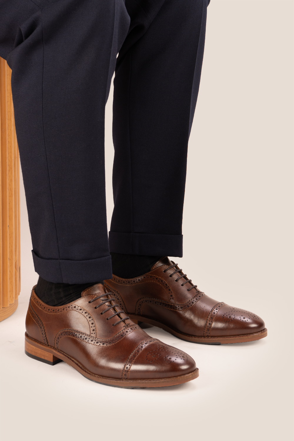 Westminster brown leather Oxford brogue shoes for men, featuring a five-eyelet lace-up and classic toecap detail for a polished formal look.