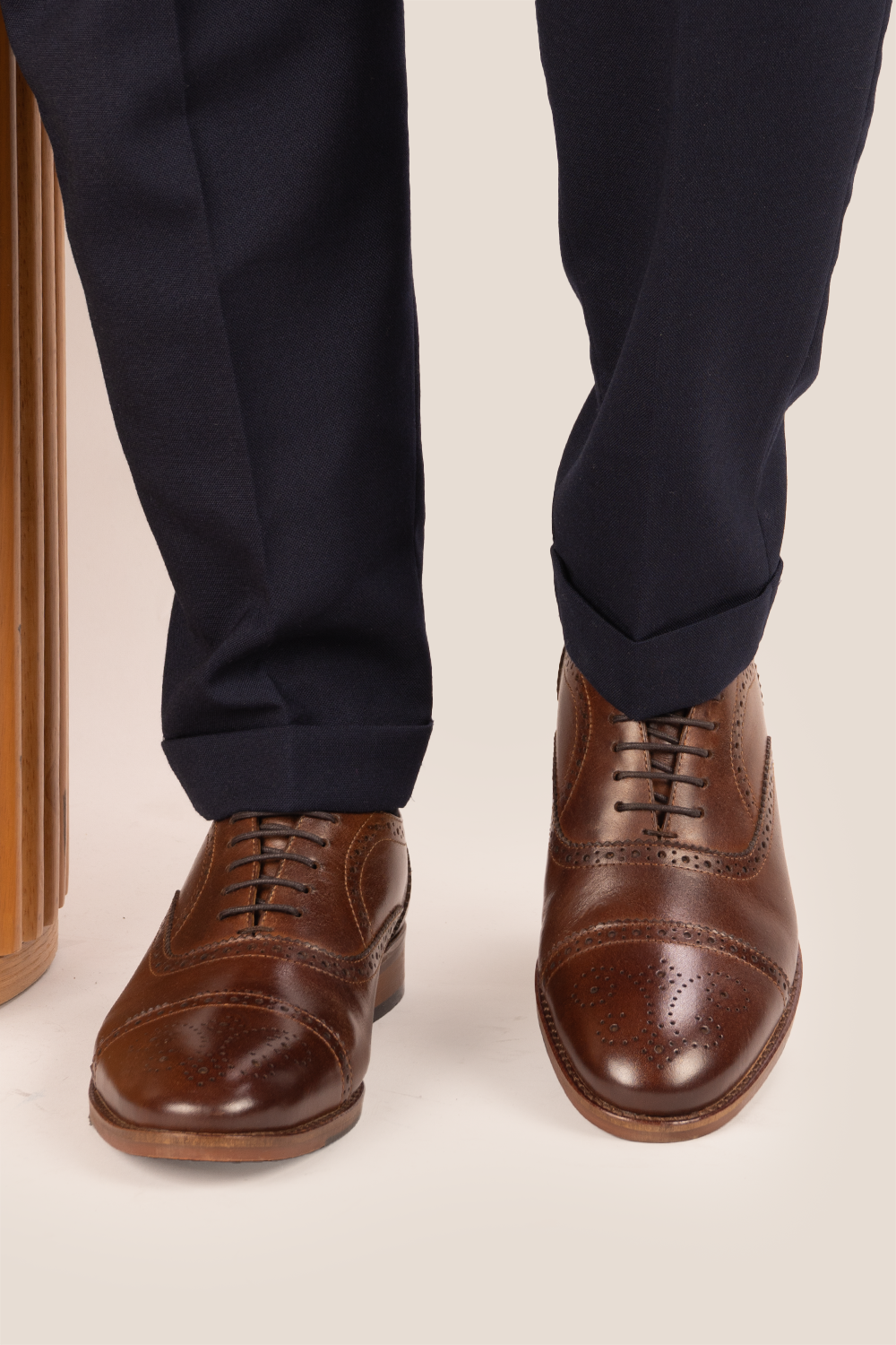 Westminster brown leather Oxford brogue shoes for men, featuring a five-eyelet lace-up and classic toecap detail for a polished formal look.