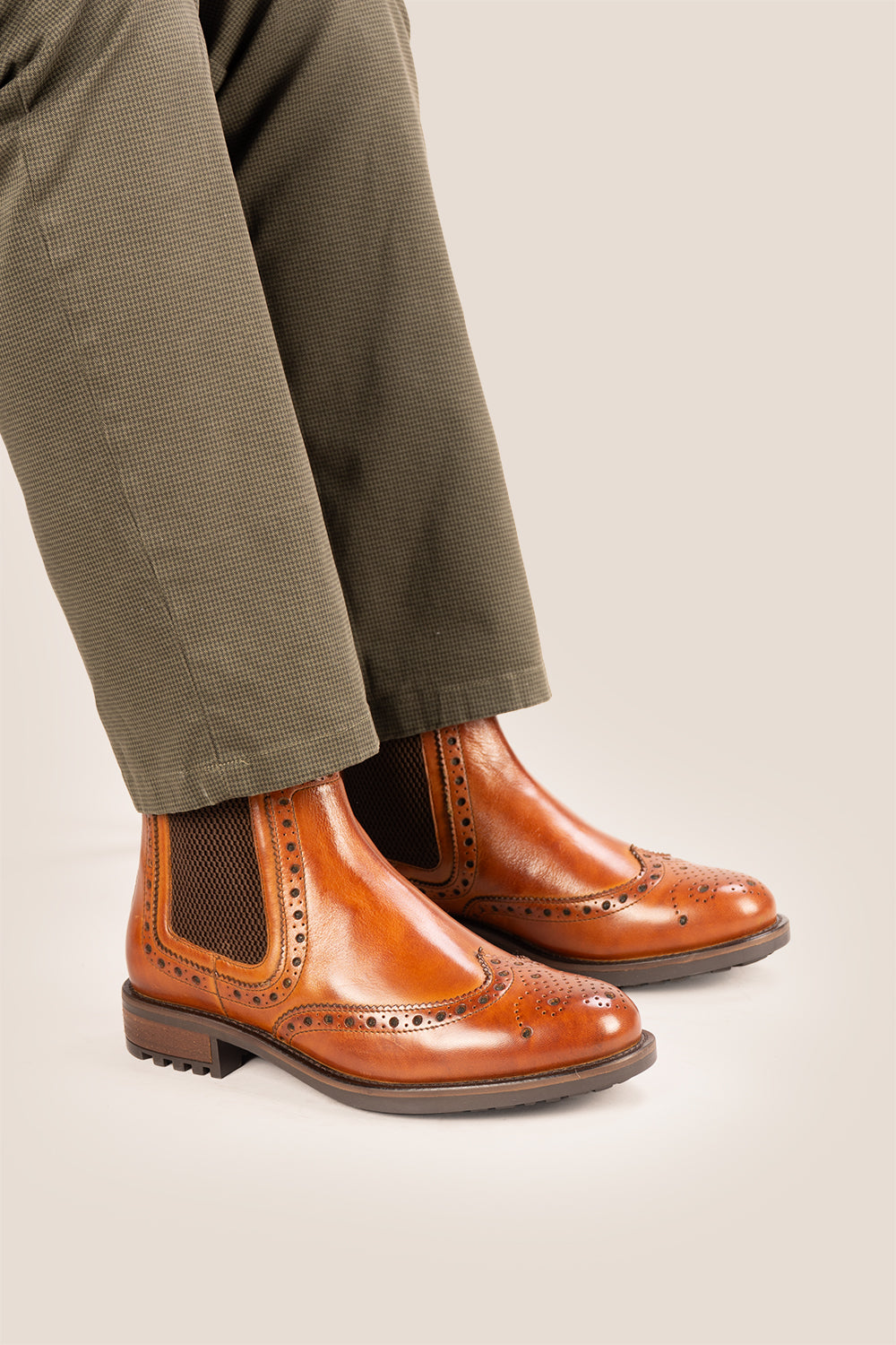 Gavin Tan leather Chelsea boots for men featuring a classic wing cap brogue design with refined stitching and polished finish