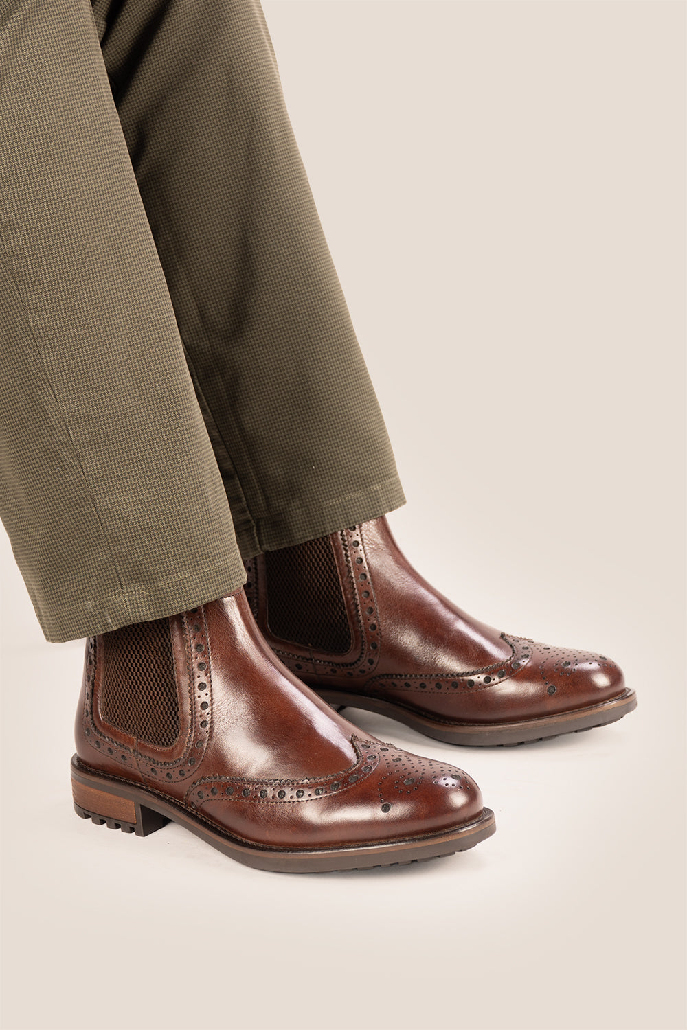 Gavin Brown leather Chelsea boots for men featuring a classic wing cap brogue design with refined stitching and polished finish