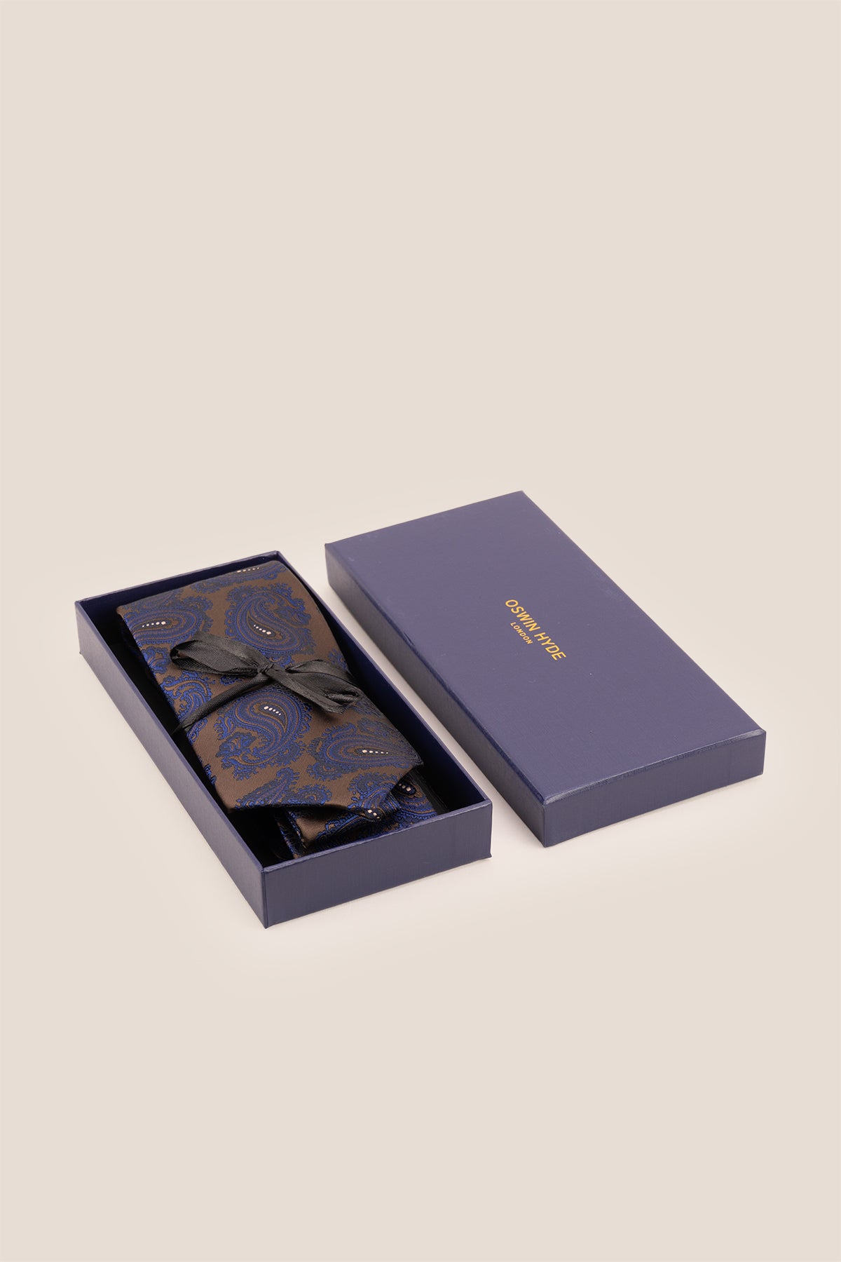 Oswin Hyde Brown Navy Paisley ties for men. The rich blend of brown and navy hues, paired with intricate paisley patterns.