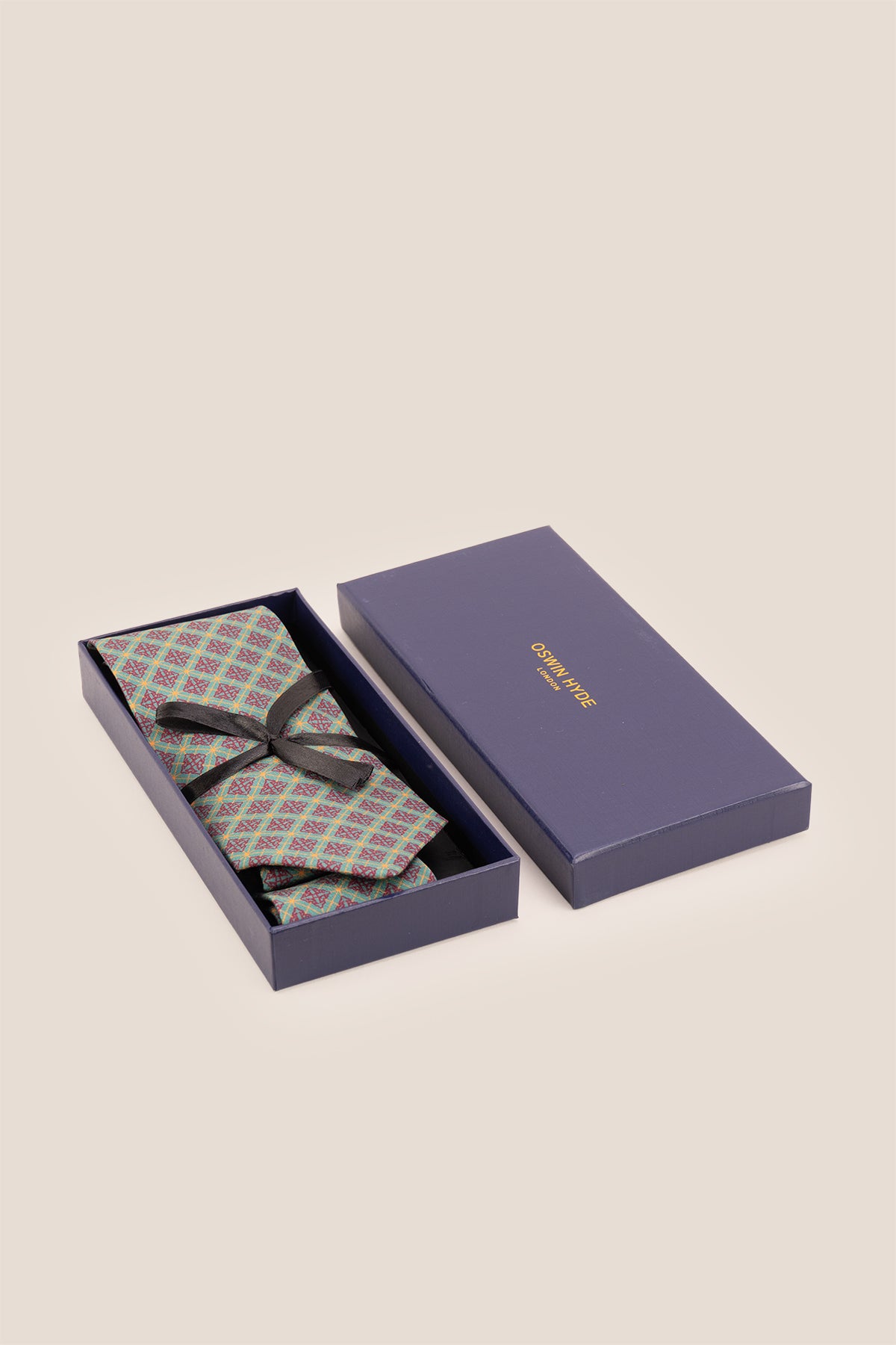 Green with Classic Brown Squares necktie. Featuring a rich green base accented by timeless brown squares