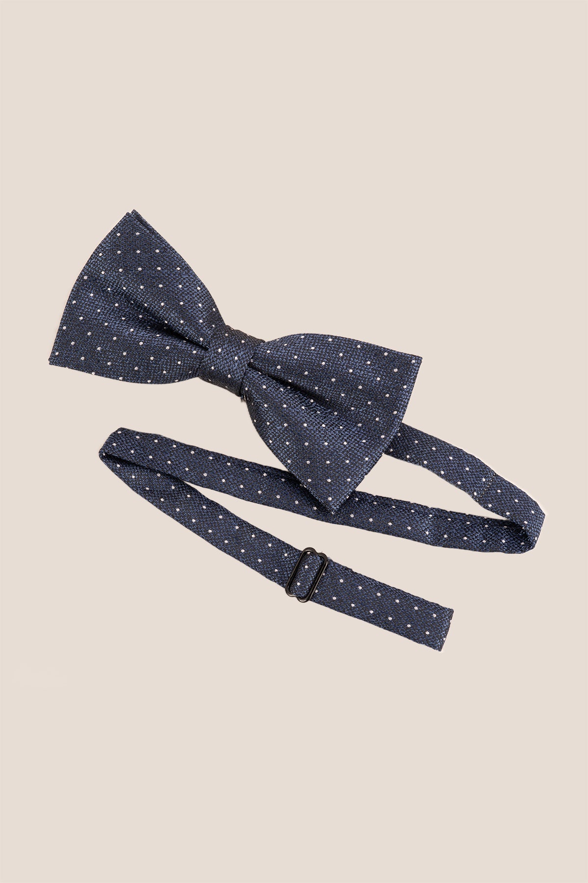 Oswin Hyde Polka Navy Bowtie. Featuring a timeless polka dot design on a rich navy background
