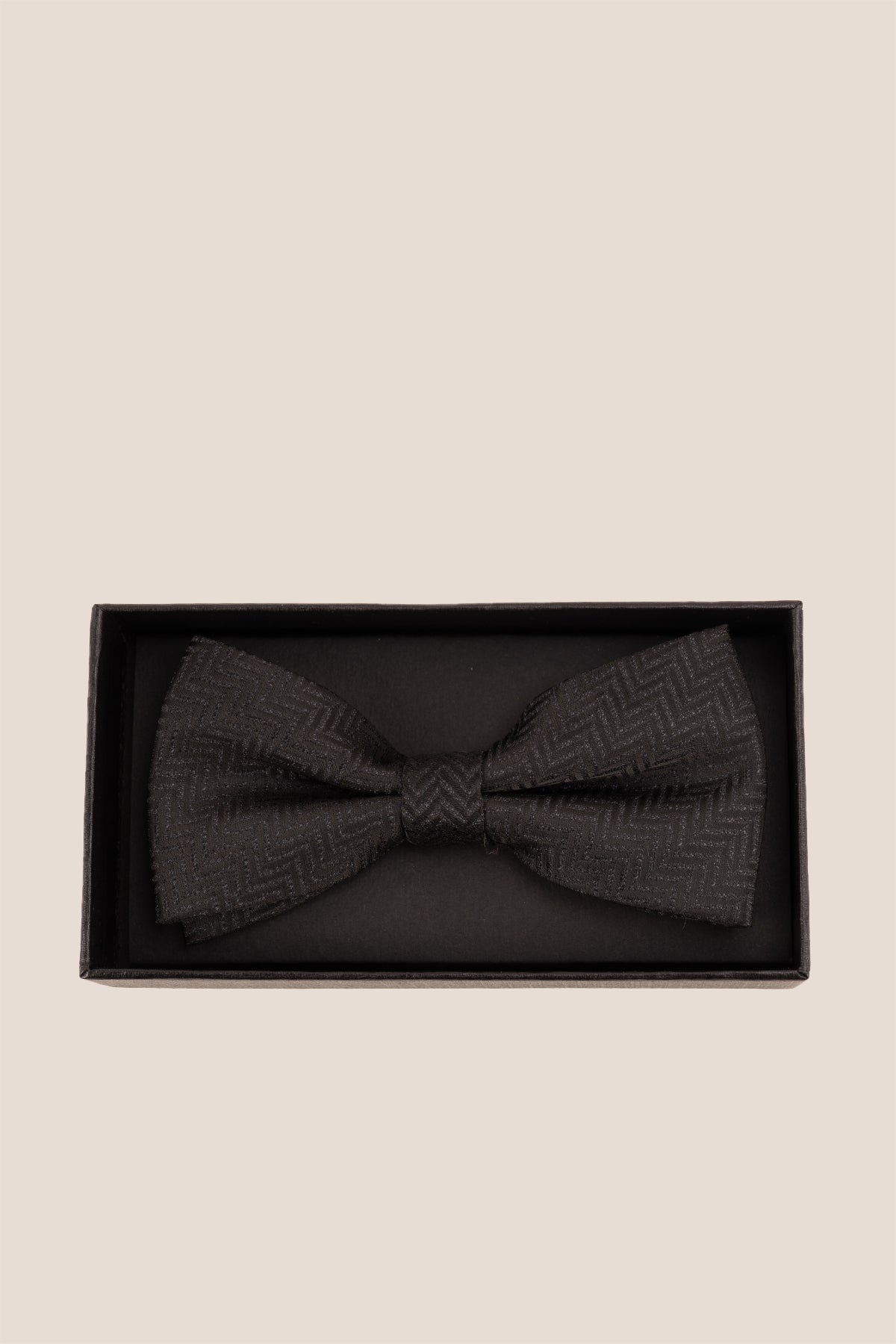 Oswin Hyde Herringbone Black Bowtie, featuring a classic herringbone pattern. deep black colour and textured fabric with an intricate design