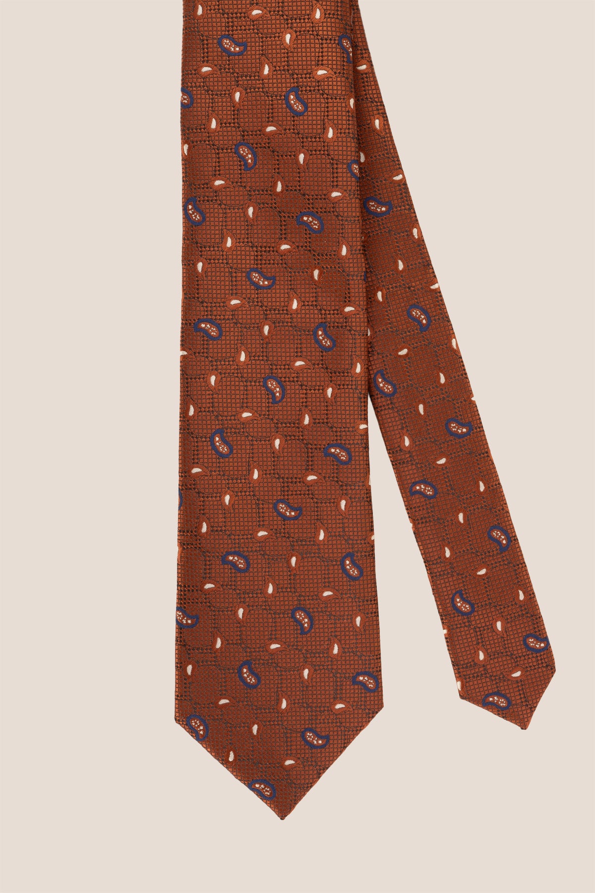 Oswin Hyde Paisley Geometric Bronze tie for men, designed to add a unique touch to your wardrobe. The intricate paisley and geometric patterns, combined with a rich bronze colour.