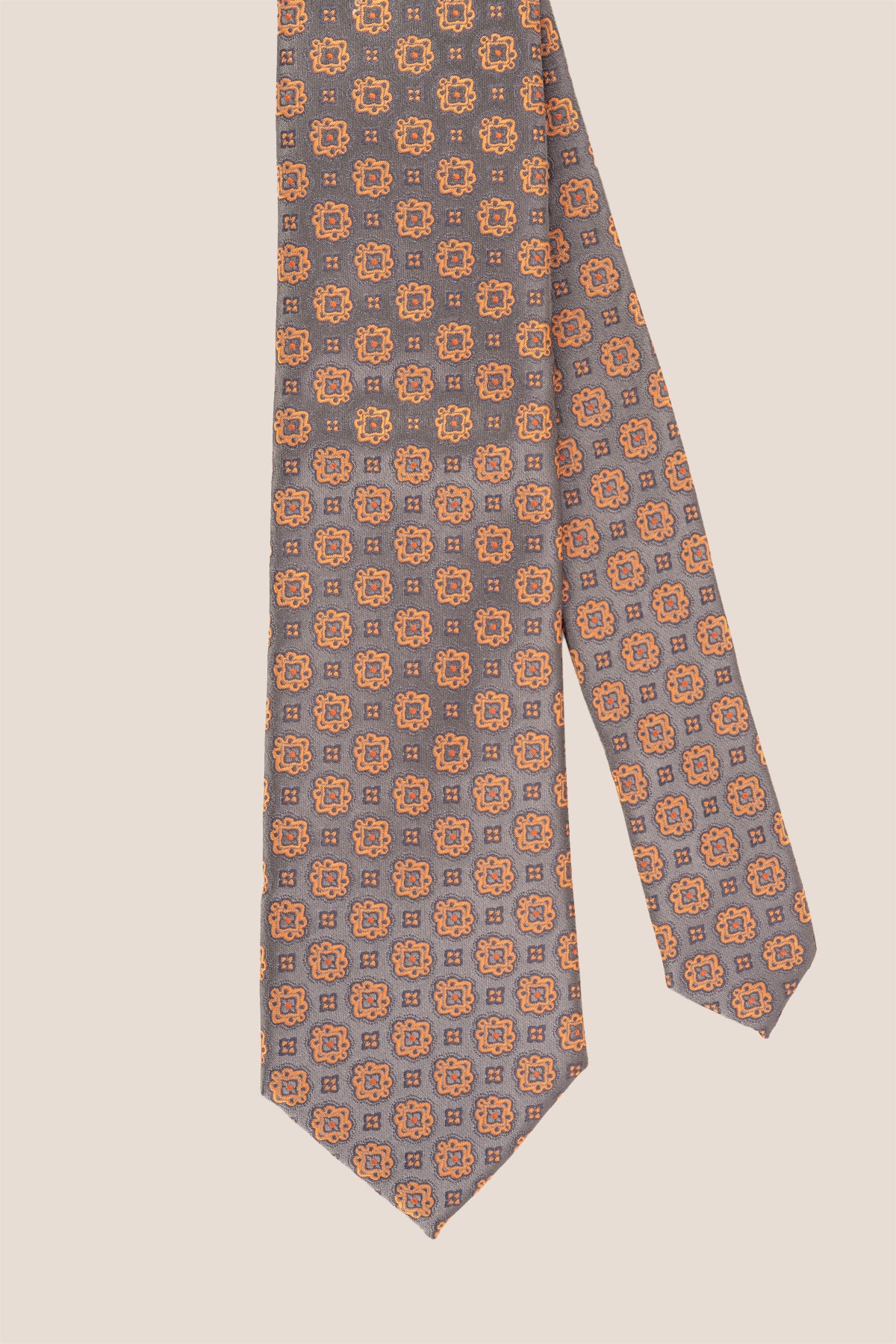 Grey Geometric Circles tie, crafted to bring a modern edge to your outfit. Its distinctive geometric circle design in muted grey shades