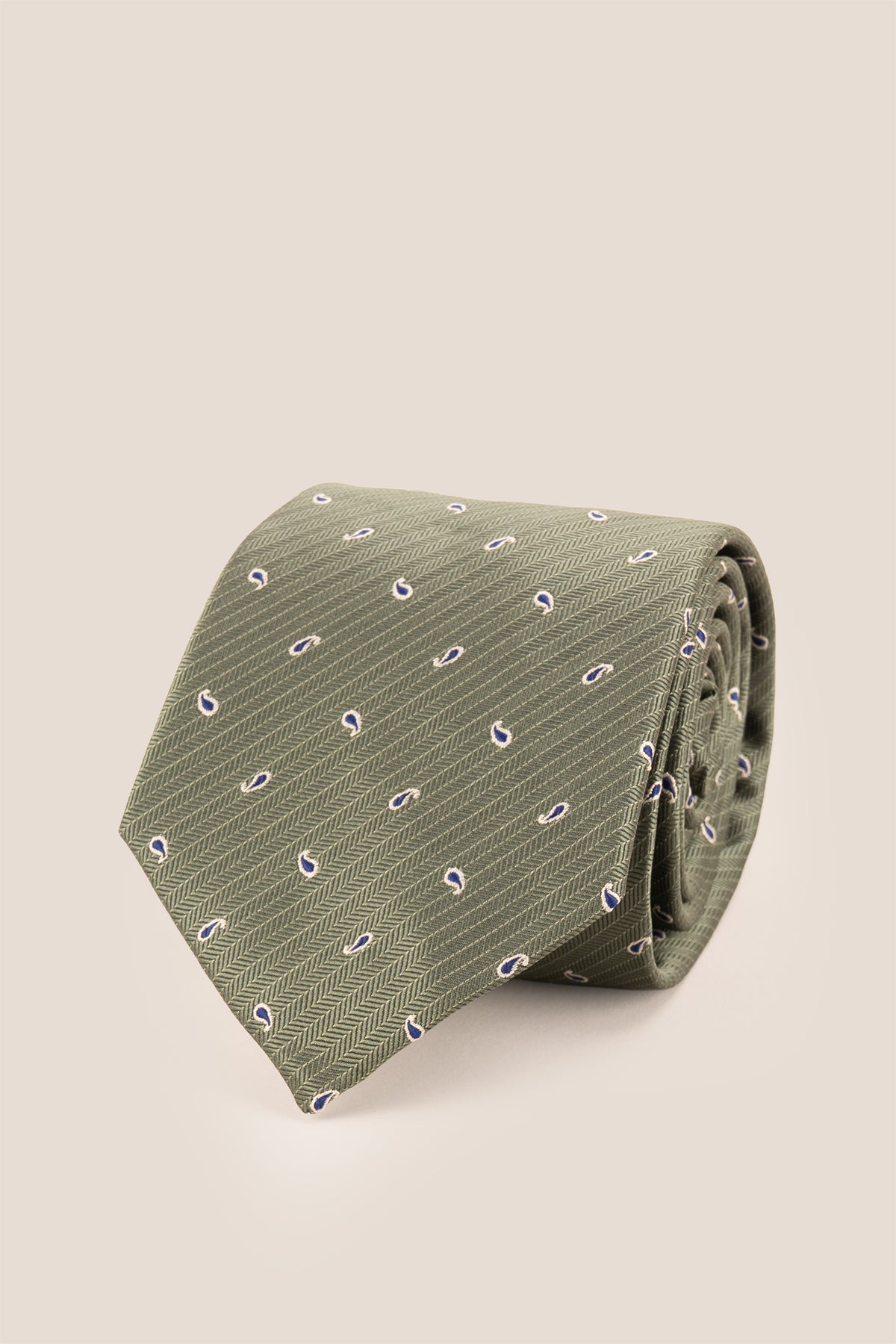 Oswin Hyde Green Micro Paisley ties for men. Featuring a subtle paisley pattern in a rich green hue, made from high-quality material.