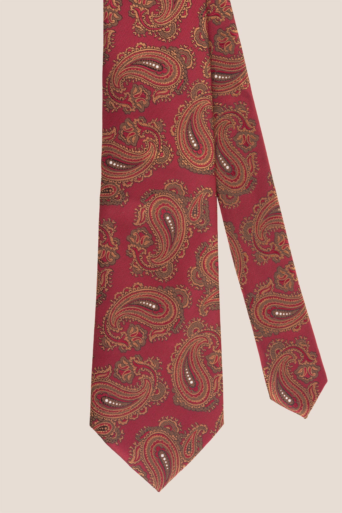 Red Copper Paisley ties for men. The vibrant red and copper hues, combined with intricate paisley patterns, make this tie perfect for any formal or semi-formal event.