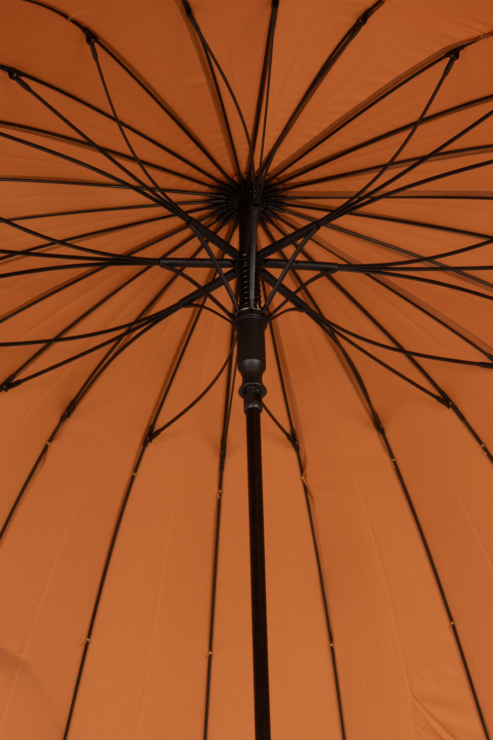Joseph Sand men’s windproof umbrella with wooden J-handle, combining classic style and durable construction for elegant all-weather protection.