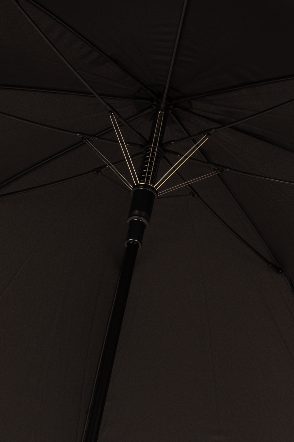 Jonathan Black classic umbrella with a sturdy canopy and refined bamboo wooden handle, perfect for daily use or as a sophisticated golf umbrella.