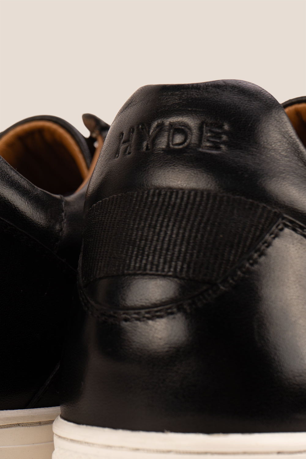 Hayes Black leather sneakers for men, featuring a classic seven-eyelet design that brings a touch of sophistication to your casual wardrobe. Made from premium leather