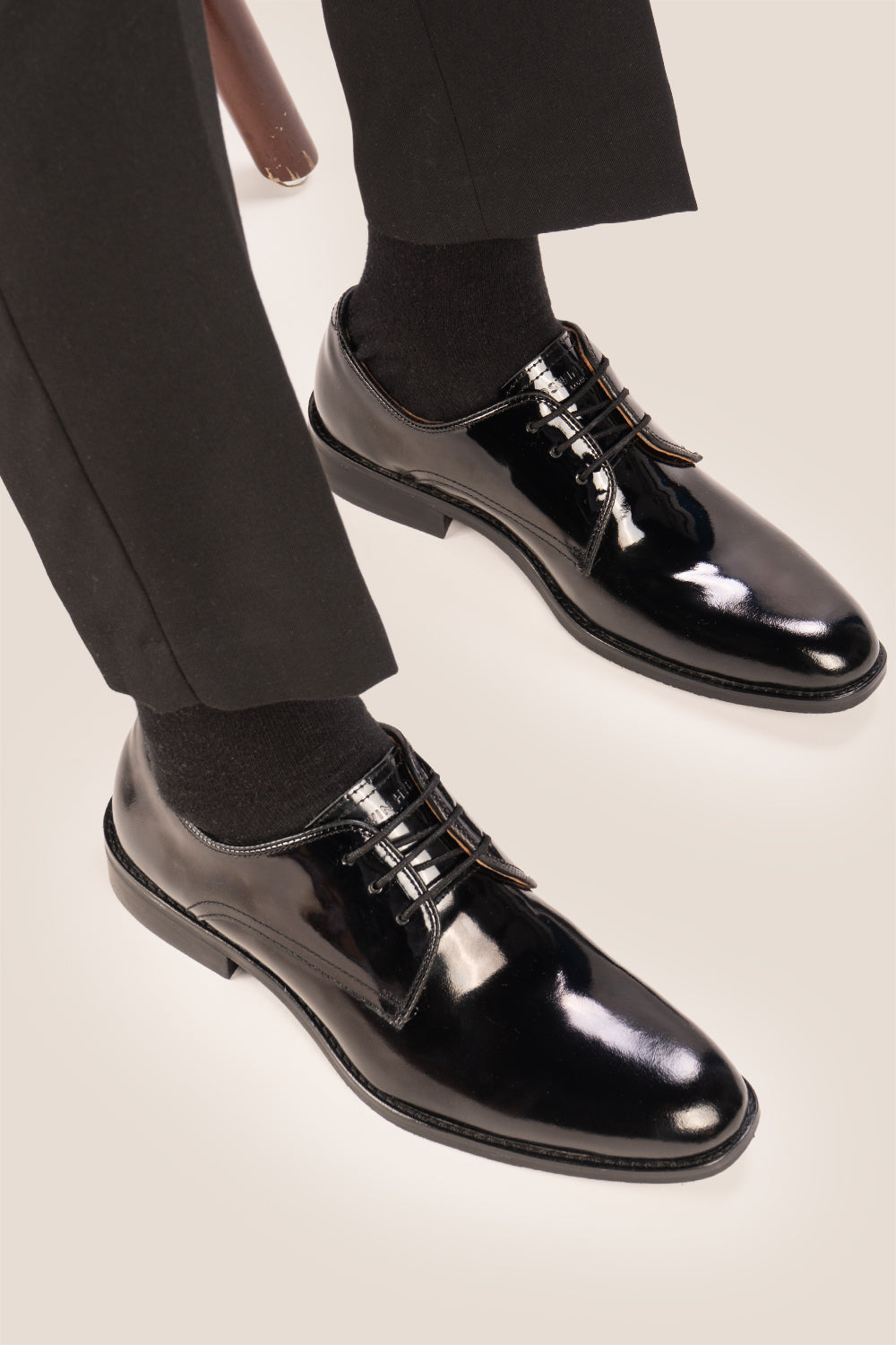Edison Black patent derby men’s leather shoes with three-eyelet design and polished finish, perfect for formal occasions.