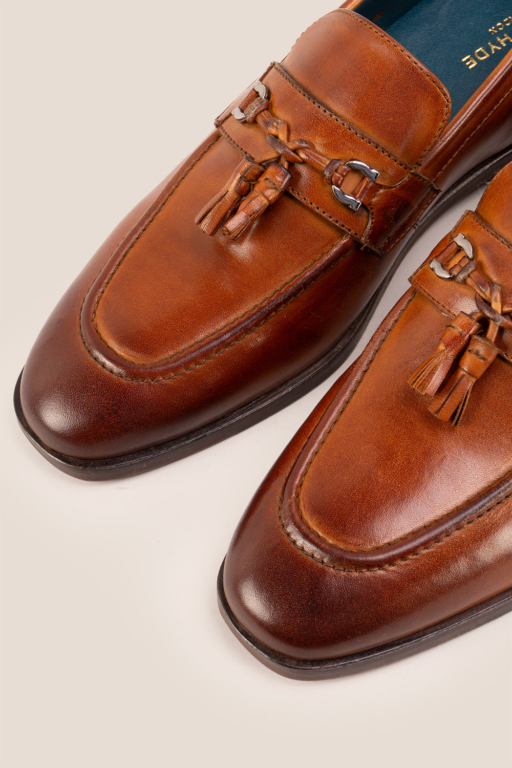 Emmet Tan men’s leather loafers featuring premium tan leather with tassel trim, ideal for formal and smart casual wear.