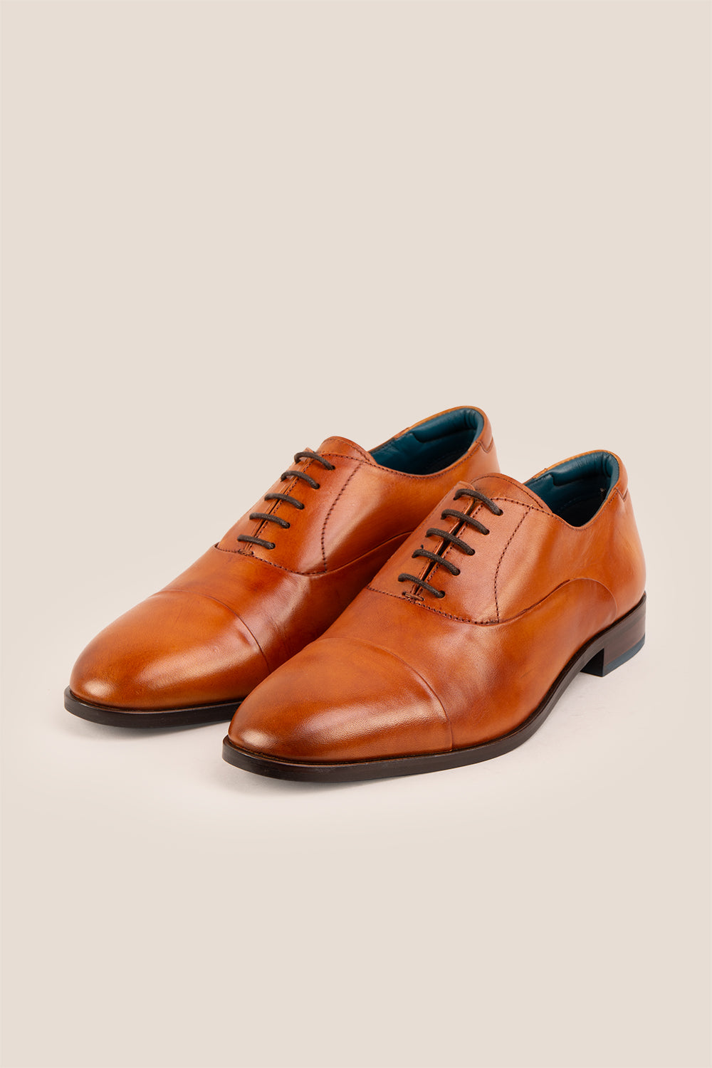 Men’s Jarvis Tan oxford lace-up leather shoes with sleek design, crafted for elegant office wear and lasting comfort.