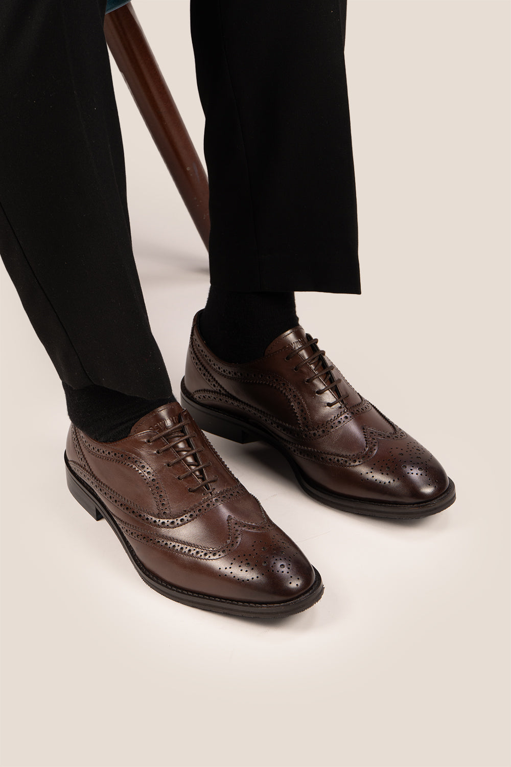 Stokes Brown Oxford Brogue Wing Cap leather shoes for men, crafted with premium brown leather and intricate brogue detailing for formal style.
