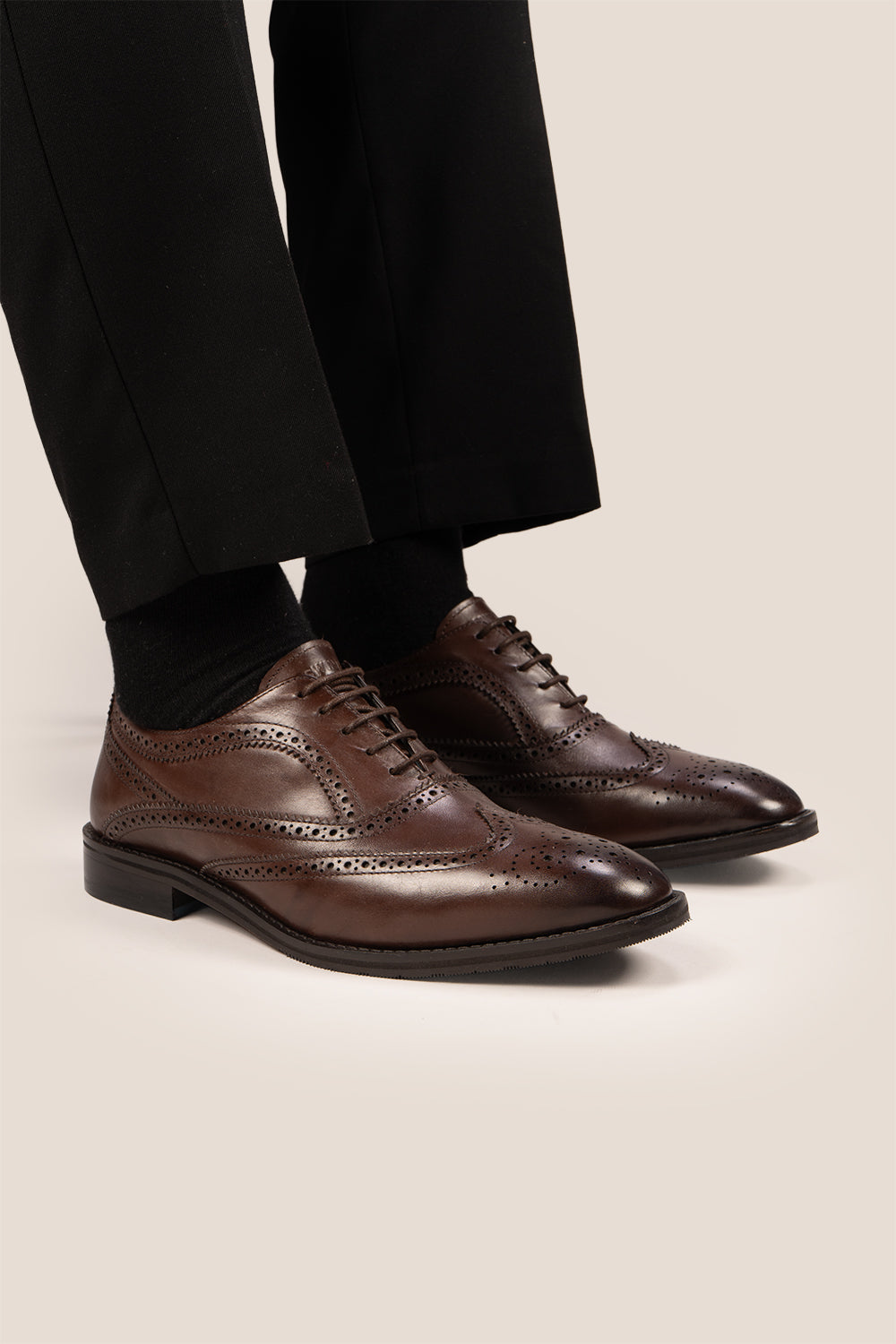 Stokes Brown Oxford Brogue Wing Cap leather shoes for men, crafted with premium brown leather and intricate brogue detailing for formal style.