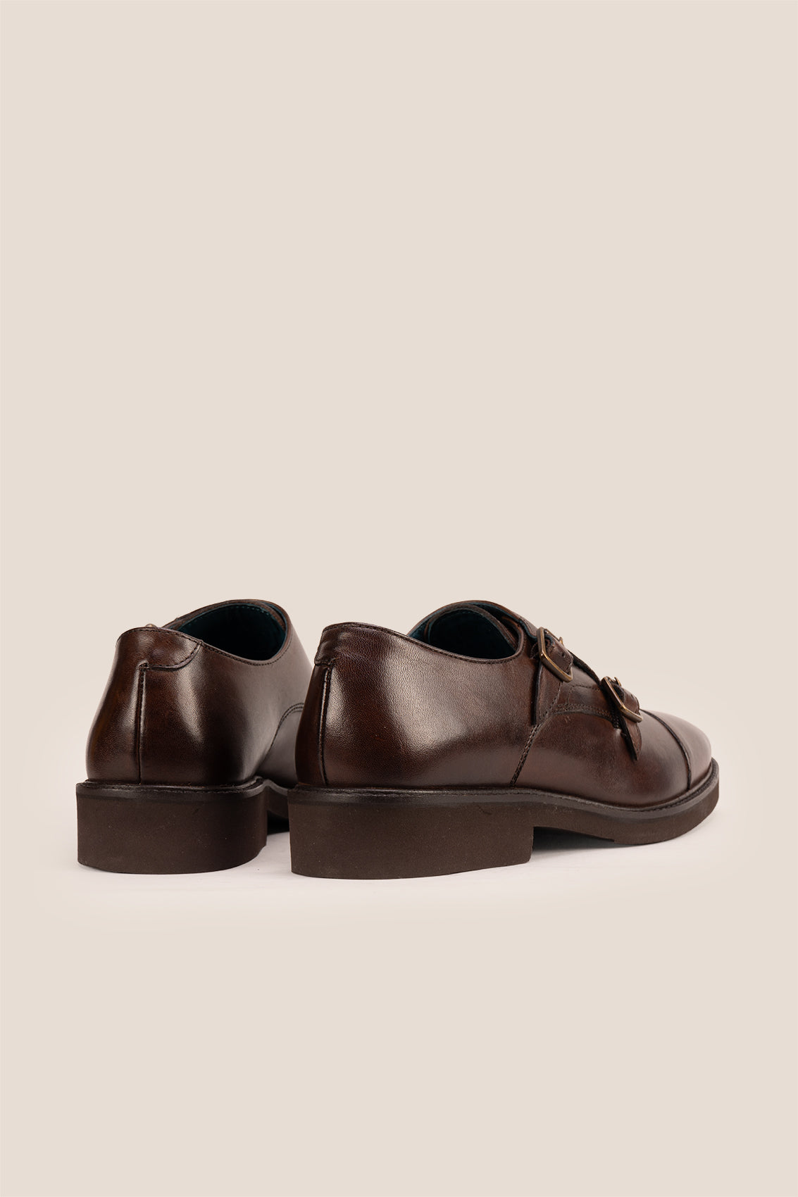 Garson brown monk strap leather men’s shoes with premium craftsmanship, sleek design, and classic buckle detail for formal and office wear.