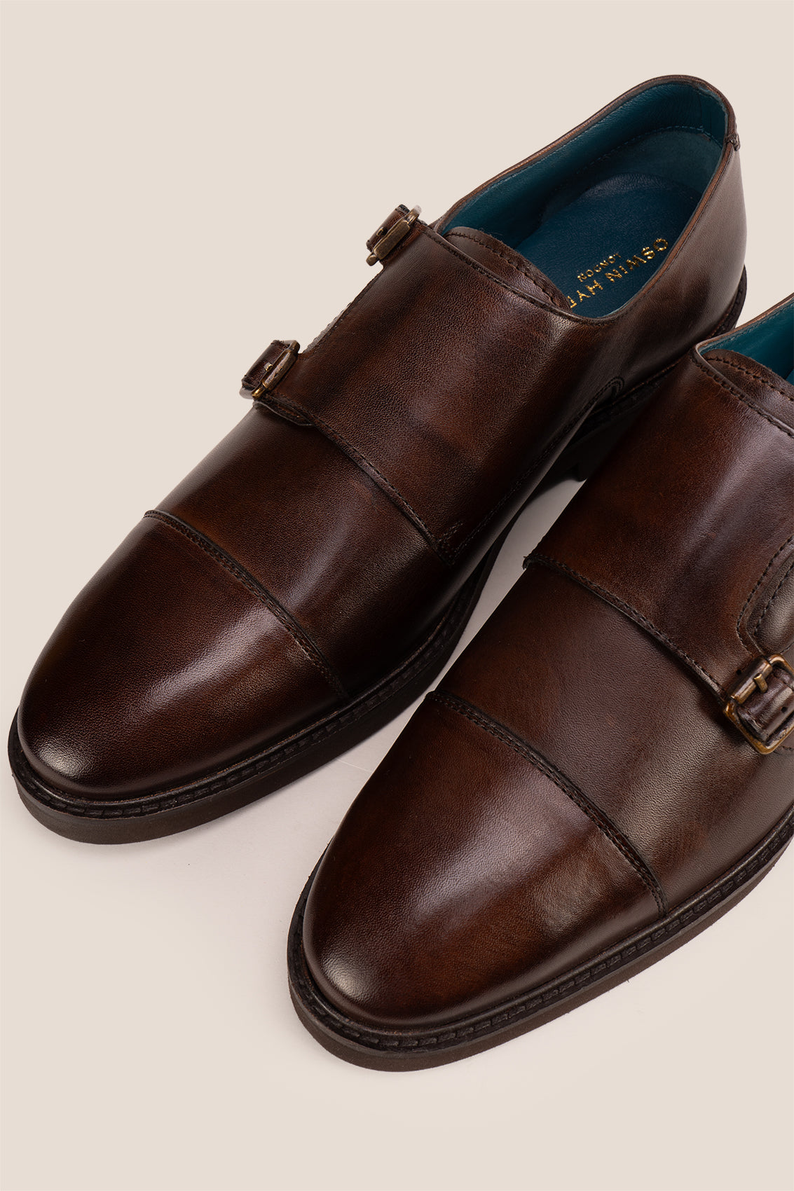 Garson brown monk strap leather men’s shoes with premium craftsmanship, sleek design, and classic buckle detail for formal and office wear.